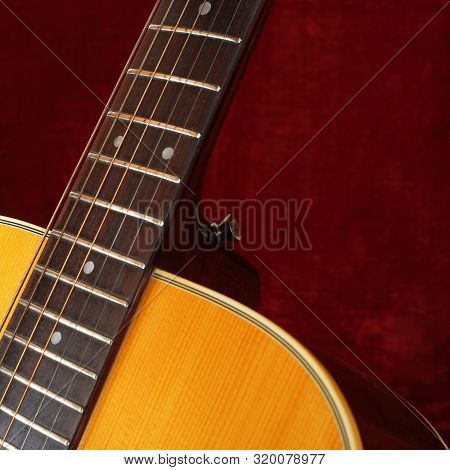 Musical Instrument - Closeup Fragment Strings And Neck Vintage Acoustic Guitar.