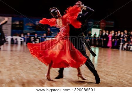 Blurred Motion Couple Of Dancers On Parquet Ballroom Dance