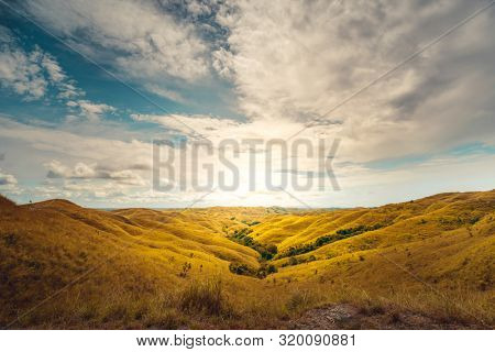 Beautiful panorama landscape Wairinding hill, Waingapu, East Sumba, East Nusa Tenggara, Indonesia. Wild nature background. Travel, holidays recreation