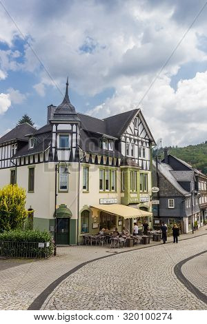Freudenberg, Germany - August 02, 2019: People Sitting Outside A Restaurant In Freudenberg, Germany