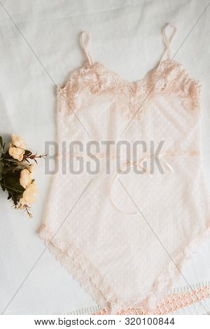 Transparent Underwear. One-piece Sexy Underwear On The Bed.