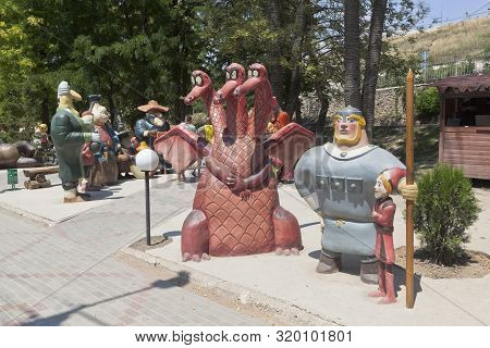 Bakhchisaray, Crimea, Russia - July 22, 2019: Three Heroes Cartoon Characters In The Bakhchisarai Mi