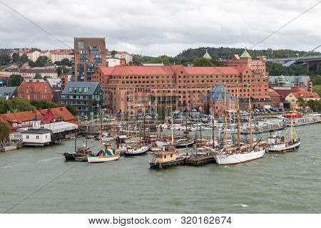 Gothenburg A Beautiful City In Sweden, A View From The River Gota Alv On The Shore Line With Boats A