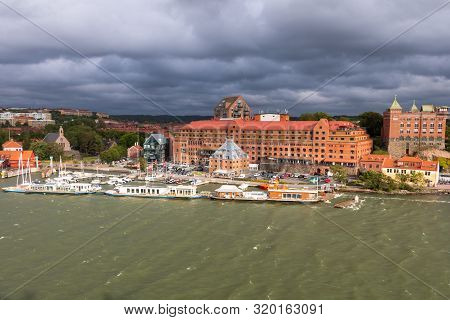 Gothenburg A Beautiful City In Sweden, A View From The River Gota Alv On The Shore Line With Boats A