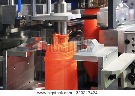 Formation Of Plastic Cans In The Mold