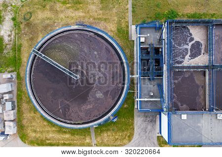 Water Treatment Plant With Round Cylinder Of Clarifier Sedimentation Tank, Aerial Top View.