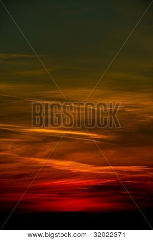 Sunset sky with dark clouds