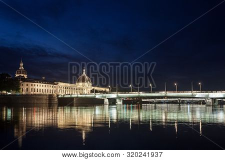 Pont De La Guillotiere Bridge In Lyon, France Over A Panorama Of The Riverbank Of The Rhone River (q