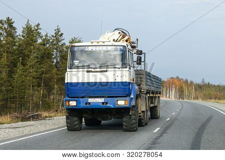 Surgut, Russia - October 7, 2016: Semi-trailer Truck Ural 44202-80 At The Interurban Road.