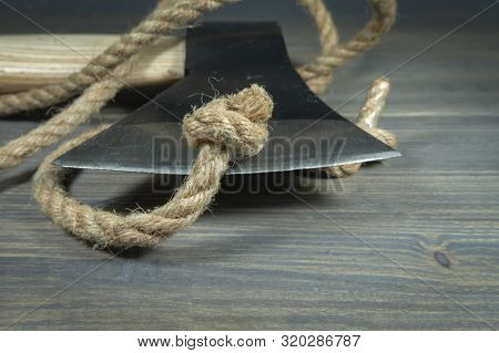 Metal Axe Or Hatchet Tool Cutting Natural Jute Rope. To Cut The Gordian Knot, Problem Solving And So