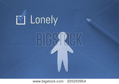 Loneliness Concept Image. Paper Cut Of One Person