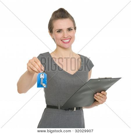 Smiling Realtor Holding Clipboard And Giving Keys Isolated