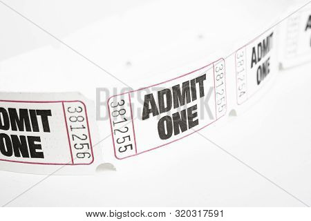 A Macro Or Close-up Shot Of A Strip Of Generic White Sequentially Numbered Admittance Paper Ticket.