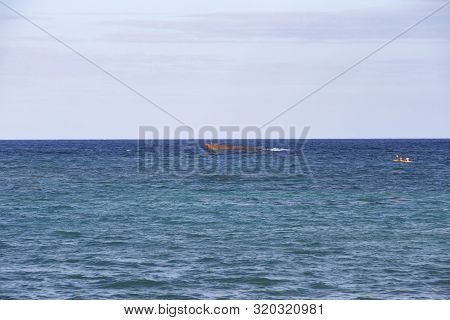 Sunken Ship And Sargassum Algae In The Atlantic Ocean