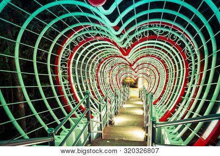 A Stairway Leading Through A Tunnel Of Hearts In Jewangsan Park In Chinhae, South Korea
