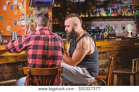 Friendship And Leisure. Friday Relaxation In Bar. Friends Relaxing In Pub. Hipster Brutal Bearded Ma