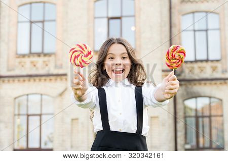 Both Mine. Cheat Meal Day. Happy Kid With Sweet Candy. Kid Child Holding Lollipops Candy Outdoors. H