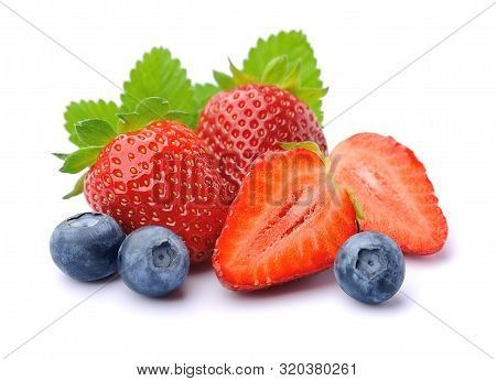 Sweet Strawberry And Blueberries Isolated On White Backgrounds