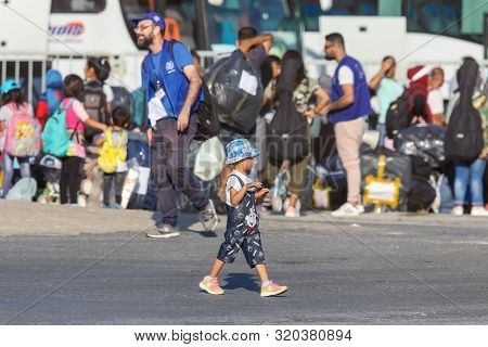 Refugees And Migrants Disembark To The Port Of Thessaloniki After Being Transfered From The Refugee