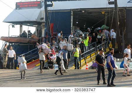 Refugees And Migrants Disembark To The Port Of Thessaloniki After Being Transfered From The Refugee