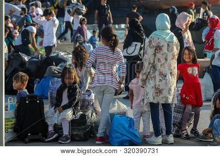 Refugees And Migrants Disembark To The Port Of Thessaloniki After Being Transfered From The Refugee
