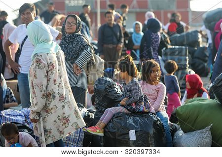 Refugees And Migrants Disembark To The Port Of Thessaloniki After Being Transfered From The Refugee