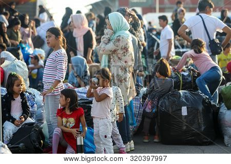 Refugees And Migrants Disembark To The Port Of Thessaloniki After Being Transfered From The Refugee