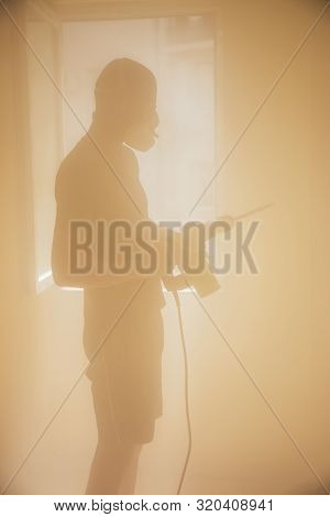 Worker With Hammer, Breaking Interior Wall Plastering