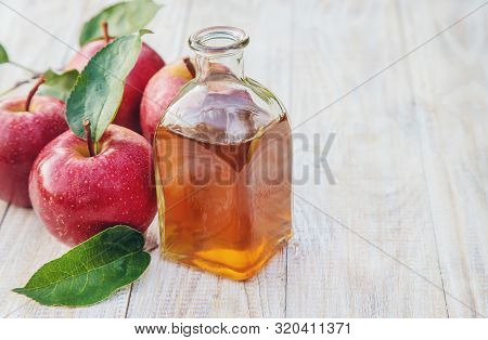 Apple Cider Vinegar In A Bottle. Selective Focus.