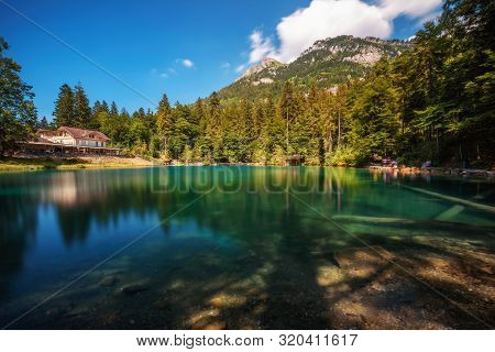 Mountain Lake Blausee Located In The Kander Valley Above Kandergrund In The Jungfrau Region. Long Ex