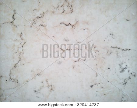 Close-up Of Pink Marble With Dark Streaks And Splashes