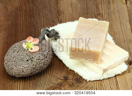 Handmade Bar Of Soap, Pumice Stone And Washcloth. Olive Soap, Facecloth And Pumice Stone On Wooden B