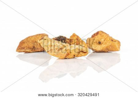 Group Of Three Pieces Of Roseship Of Lingonberry Strawberry Fruit Tea Macro Isolated On White Backgr