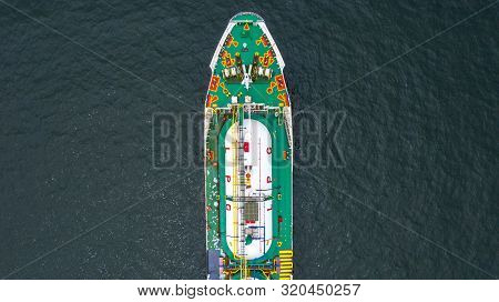 Red Tanker Ship Loading And Unloading Oil And Gas At Industrial Port, Business Import Export Petroch