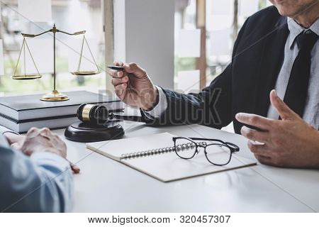 Consultation And Conference Of Male Lawyers And Professional Businesswoman Working And Discussion Ha