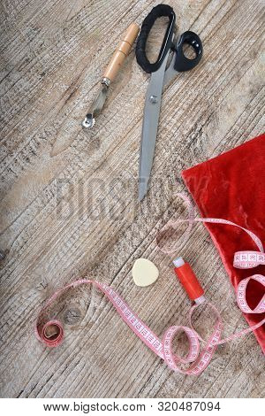 Sewing Tools And Sewing Supplies Accessories Sewing On Wooden Table.
