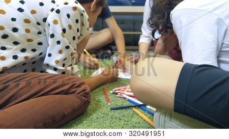 The Concept Of Childrens Group Psychotherapy. Female Psychologist Conducts A Group Consultation With