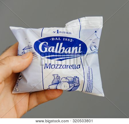 Paris, France - Aug 19, 2019: Man Hand Holding Pack With Delicious Galbani Mozzarella