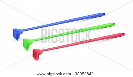 Thecolorful Plastic Backscratcher On A White Background