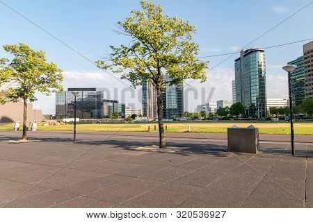 Amsterdam, Netherlands - June 6, 2019: Sidewalks Of Modern Buildings Near The Johan Cruyff Arena.