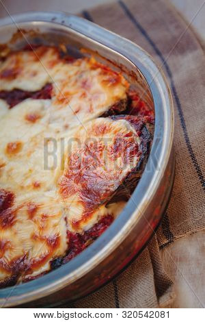 Eggplant Alla Parmigiana Melanzane Close Up In Baking Dish. Horizontal. Delicious Eggplant Alla Parm