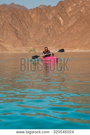 Hatta Kayaking Young Man Kayaking In Hatta Dam Beautiful Place For Water Adventure Activities Like B