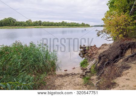 City Carnikava, Latvian Republic. Green Nature In Summer With River Gauja And Waves. Travel Photo. S