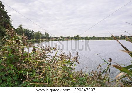 City Carnikava, Latvian Republic. Green Nature In Summer With River Gauja And Waves. Travel Photo. S