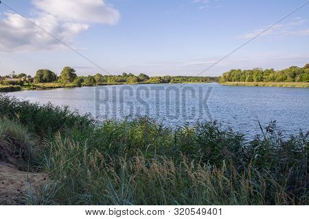 City Carnikava, Latvian Republic. Green Nature In Summer With River Gauja And Waves. Travel Photo. S