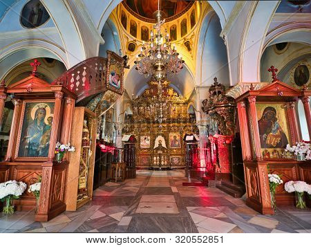 Ano Mera, Mykonos, Greece - July 23 2019 Interior With Various Sacred Images And Altars With Decorat
