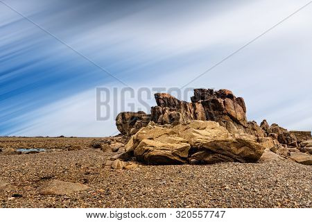 Rock Formation Against Sky In Sillon De Talbert Area