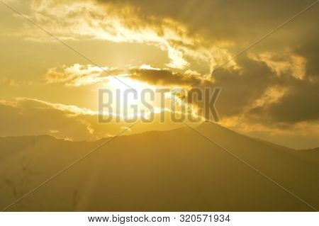 Dramatic Dark Heavily Red Sunset Clouds Makes The Sky Romantic On One Evening In Mid December. Sunli