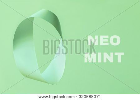 Mobius Strip Soaring In The Air On Mint Background