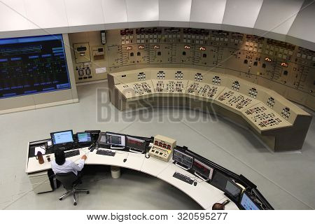 Itaipu, Brazil - October 11, 2014: Staff Works At Itaipu Binacional Power Plant Control Room. The Fa